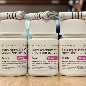 Dexamphetamine medication in sealed pharmacy containers labelled with dosage strength in milligrams and the quantity of tablets inside. Dexamphetamine For Sale Australia