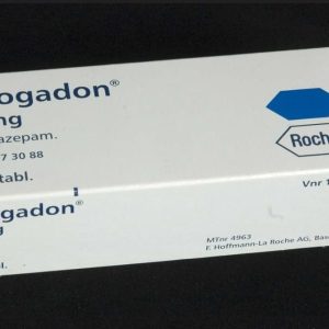 Mogadon tablets in a sealed blister packet placed on a black background, clearly labelled with dosage measurement and the total number of tablets. Mogadon For Sale Australia